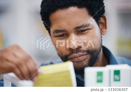 Pharmacy, medicine and pills, black man and face, healthcare and prescription medication in drug store. Medical, closeup and pharmaceutical product for health, wellness and treatment with pharmacist 133036307