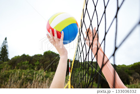 Hands, fitness and beach net volleyball with woman scoring goals in competition, game or match. Sports, training and female athlete holding ball in tournament to score for exercise or workout outdoor Hands, fitness and beach net volleyball with woman scoring goals in competition, game or match. Sports, training and female athlete holding ball in tournament to score for exercise or workout outdoor 133036332