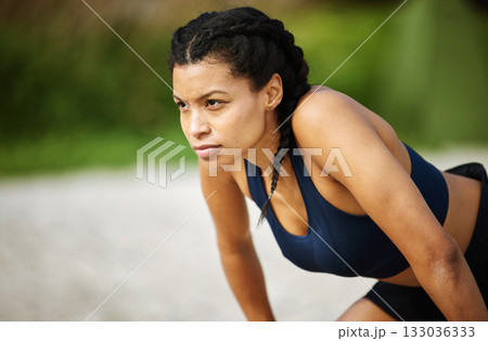 Beach, fitness and focus with a woman runner breathing while outdoor for cardio or endurance training. Exercise, tired or rest and a female athlete taking a break from running on the sand with mockup Beach, fitness and focus with a woman runner breathing while outdoor for cardio or endurance training. Exercise, tired or rest and a female athlete taking a break from running on the sand with mockup 133036333