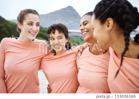 Volleyball, beach or sports women hug in playing a game in training or fitness workout together. Team solidarity, funny girls support or happy friends on sand hugging or laughing in match in Brazil 133036389