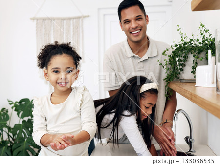 Family, father and children washing hands in portrait, hygiene and health with happiness at home. Man, young girls together and smile in bathroom, healthy and clean for safety from bacteria Family, father and children washing hands in portrait, hygiene and health with happiness at home. Man, young girls together and smile in bathroom, healthy and clean for safety from bacteria 133036535