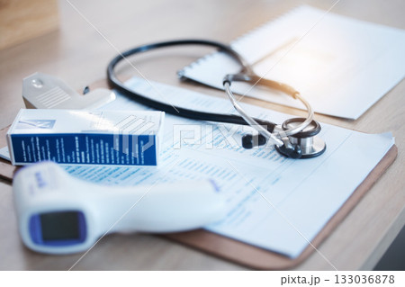 Covid thermometer, doctor data and hospital survey with stethoscope and no people in clinic. Healthcare, wellness and medical paperwork and contract for corona security and health care support 133036878