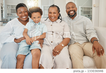 Happy, smile and portrait of a black family on a sofa relaxing, resting or bonding together. Happiness, love and African boy child sitting with his mother and grandparents on a couch in living room. Happy, smile and portrait of a black family on a sofa relaxing, resting or bonding together. Happiness, love and African boy child sitting with his mother and grandparents on a couch in living room. 133036946