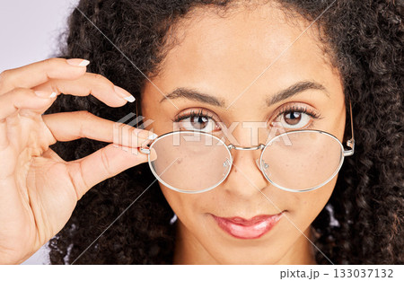 Vision, portrait and black woman in studio, confident and holding spectacles frame. Face, attitude and prescription eyewear for lady showing eye care, glasses and optician, eyesight or trendy eyewear Vision, portrait and black woman in studio, confident and holding spectacles frame. Face, attitude and prescription eyewear for lady showing eye care, glasses and optician, eyesight or trendy eyewear 133037132