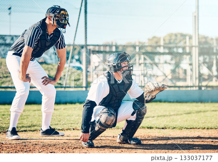 Sports, baseball and umpire with man on field for fitness, pitching and championship training. Workout, catcher and exercise with athlete playing at stadium for competition match, cardio and league Sports, baseball and umpire with man on field for fitness, pitching and championship training. Workout, catcher and exercise with athlete playing at stadium for competition match, cardio and league 133037177