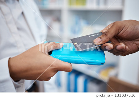 Credit card, hands and payment tap machine for retail, healthcare and people in pharmacy drug store. Money, technology and shopping for prescription medicine, health insurance and customer buying Credit card, hands and payment tap machine for retail, healthcare and people in pharmacy drug store. Money, technology and shopping for prescription medicine, health insurance and customer buying 133037310