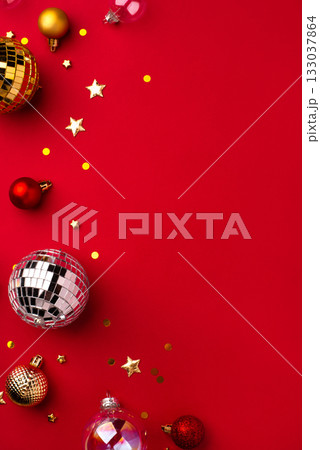 Christmas ornaments on a red background. 133037864