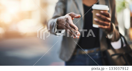 Woman, handshake and meeting in city with coffee for greeting, introduction or hiring outdoors. Hand of female shaking hands for b2b, collaboration or agreement in deal or recruitment in urban town Woman, handshake and meeting in city with coffee for greeting, introduction or hiring outdoors. Hand of female shaking hands for b2b, collaboration or agreement in deal or recruitment in urban town 133037912