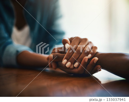 Empathy, love and support with friends and holding hands for comfort, kindness and gratitude. Hope, help and trust with closeup of people at home for depression, praying and forgiveness 133037941