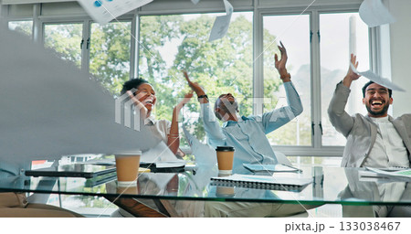 Teamwork, applause and celebration with documents in meeting, success or collaboration on deal with happy staff. Office, goals and business people winning achievement with pride and paperwork in air 133038467