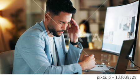 Business man, headache and pain on computer screen for information technology solution, website mistake or error. IT expert with migraine, stress and fatigue or tired on desktop and laptop at night Business man, headache and pain on computer screen for information technology solution, website mistake or error. IT expert with migraine, stress and fatigue or tired on desktop and laptop at night 133038529