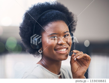 Portrait, call center and support with a black woman consultant working in her telesales office. Contact us, customer service and telemarketing with a female employee consulting using a headset 133038681