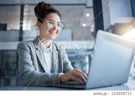 Professional woman typing on laptop in online internship job, research or career business management. Happy young person working on notebook computer for software, app or internet review or analysis 133038711
