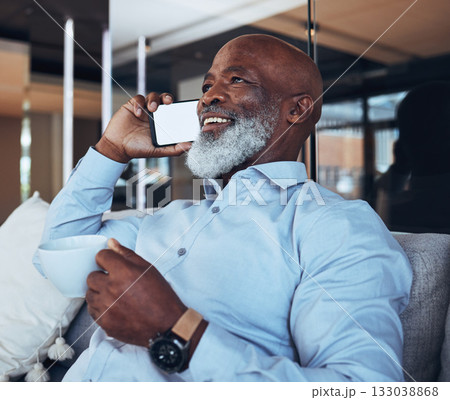 Coffee, relax and black man on a phone call for communication, networking and planning. Happy, conversation and mature businessman with a mockup mobile for talking, discussion and happy with tea 133038868