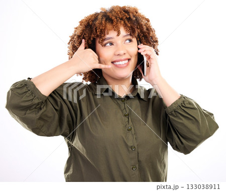 Call me, hand and gesture by black woman with phone happy for communication by fun, excited and young female. Talking, conversation and person with wifi service isolated in a studio white background 133038911