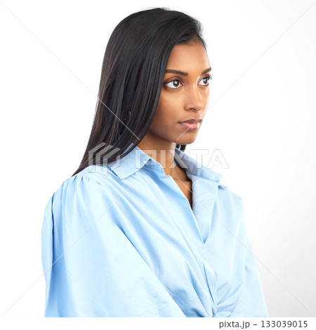 Serious, face and Indian woman on a white background in studio for mindset, calm attitude and thinking. Copy space, mockup and isolated confident, thoughtful and attractive girl in trendy clothes 133039015