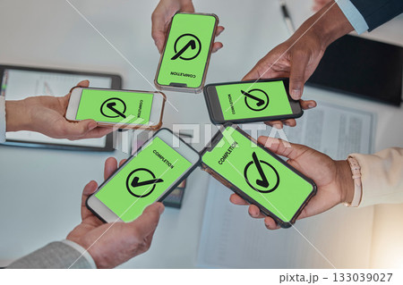 Business people, hands and phone with tick in networking, teamwork planning or sharing information. Hand of group above showing smartphone display in completion for tasks, mobile app or data syncing Business people, hands and phone with tick in networking, teamwork planning or sharing information. Hand of group above showing smartphone display in completion for tasks, mobile app or data syncing 133039027