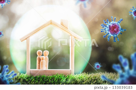 Wooden home with happy family of wooden doll is placed inside on nature bokeh. Wooden home with happy family of wooden doll is placed inside on nature bokeh. 133039183
