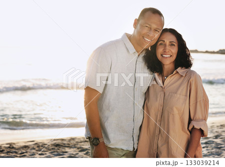 Senior couple, smile and portrait at beach, having fun on vacation or holiday mockup. Romance, love or happy, elderly and retired man and woman by ocean or seashore enjoying time together at sunset 133039214