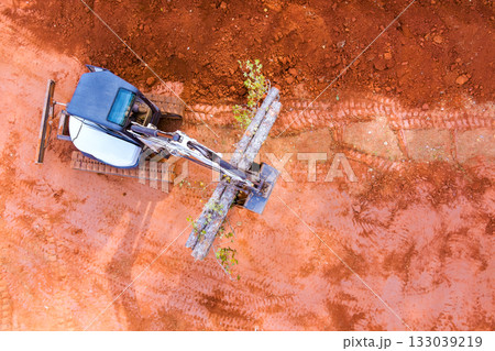 Construction equipment clearing land for new project on red dirt Construction equipment clearing land for new project on red dirt 133039219