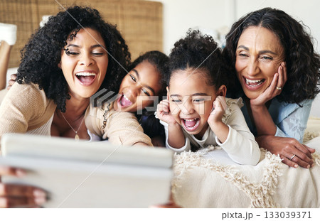 Smile, selfie and tablet with family in bedroom for relax, social media and funny face together. Bonding, technology and internet with women and picture at home for happiness, browsing and photo Smile, selfie and tablet with family in bedroom for relax, social media and funny face together. Bonding, technology and internet with women and picture at home for happiness, browsing and photo 133039371