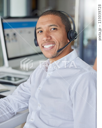 Black man, call center portrait and smile by computer for consulting, contact us and tech support in office. Crm expert, consultant and customer service agent with happiness, telemarketing and sales Black man, call center portrait and smile by computer for consulting, contact us and tech support in office. Crm expert, consultant and customer service agent with happiness, telemarketing and sales 133039728