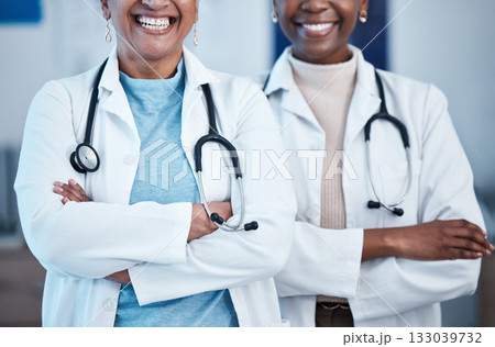 Black women, doctors and healthcare workers with happiness and solidarity in a hospital. Medical care, support and teamwork of a healthcare, wellness and health team in a clinic ready for management Black women, doctors and healthcare workers with happiness and solidarity in a hospital. Medical care, support and teamwork of a healthcare, wellness and health team in a clinic ready for management 133039732