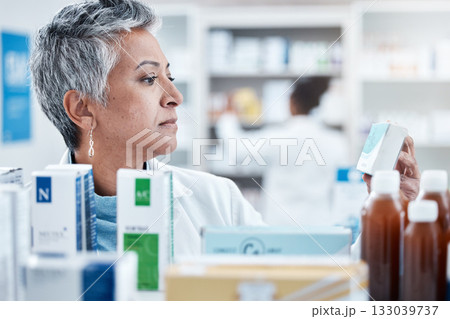 Senior woman, pharmacist and check with box, medicine or pills by shelf in store for healthcare services. Elderly pharma expert, retail stock and medical product for mockup space, health and wellness Senior woman, pharmacist and check with box, medicine or pills by shelf in store for healthcare services. Elderly pharma expert, retail stock and medical product for mockup space, health and wellness 133039737