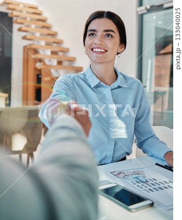 Business woman, handshake and smile for b2b, partnership or meeting in agreement at office desk. Happy female employee shaking hands with colleague for greeting, deal or welcome at workplace Business woman, handshake and smile for b2b, partnership or meeting in agreement at office desk. Happy female employee shaking hands with colleague for greeting, deal or welcome at workplace 133040025