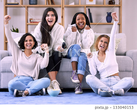Excited, friends and women in lounge, video game and quality time with achievement, cheerful and happiness. Female gamers, group and ladies with console, celebration and joyful for victory and gaming Excited, friends and women in lounge, video game and quality time with achievement, cheerful and happiness. Female gamers, group and ladies with console, celebration and joyful for victory and gaming 133040153