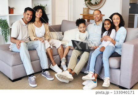 Portrait, laptop and a black family in the living room of a home together, sitting on a sofa. Love, internet or bonding with children, parents and grandparents in the lounge of a house during a visit Portrait, laptop and a black family in the living room of a home together, sitting on a sofa. Love, internet or bonding with children, parents and grandparents in the lounge of a house during a visit 133040171