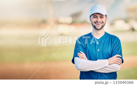 Portrait, smile and mockup with a baseball man standing arms crossed outdoor on a sports pitch. Fitness, training and happy with a young male athlete posing next to blank mock up space on a field Portrait, smile and mockup with a baseball man standing arms crossed outdoor on a sports pitch. Fitness, training and happy with a young male athlete posing next to blank mock up space on a field 133040366