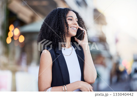 Phone call, black woman and urban street of a young person with networking and conversation. Bokeh, blurred background and female talking with happiness and a smile on a mobile web communication app Phone call, black woman and urban street of a young person with networking and conversation. Bokeh, blurred background and female talking with happiness and a smile on a mobile web communication app 133040442