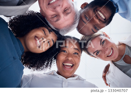 Portrait, below and happy business people in group or circle for teamwork, team building and collaboration. Face of diversity employees, worker and professional community smile together in solidarity 133040707