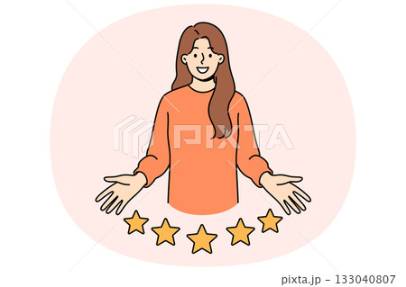 Woman user gives five-star rating for company and smiles while looking at screen Woman user gives five-star rating for company and smiles while looking at screen 133040807