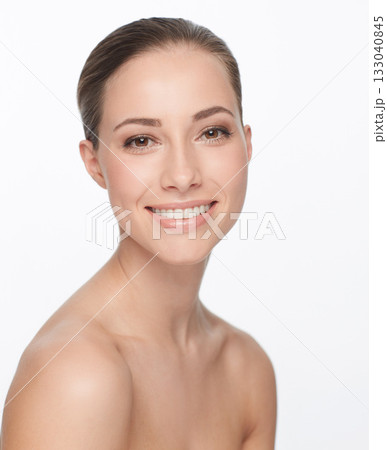 Portrait, smile and woman with beauty, dermatology and self care isolated against a white studio background. Face, female person and model with happiness, grooming and wellness with salon treatment Portrait, smile and woman with beauty, dermatology and self care isolated against a white studio background. Face, female person and model with happiness, grooming and wellness with salon treatment 133040845