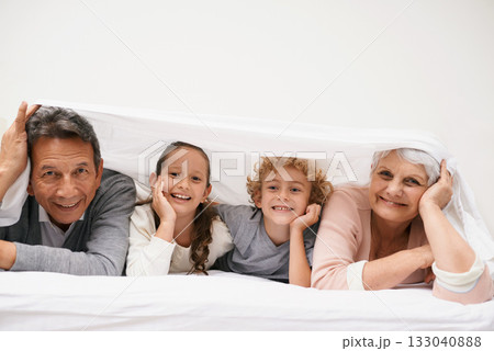 Portrait, grandparents or happy kids in bedroom to relax together for bonding in Australia with love or care. Morning, faces or grandmother with children or mature old man to enjoy quality bed time 133040888