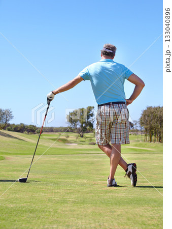 Golf, rear view and old man with driver outdoor for training, hobby and sports on blue sky background. Club, behind and active senior male golfer on field for retirement fitness, match or practice Golf, rear view and old man with driver outdoor for training, hobby and sports on blue sky background. Club, behind and active senior male golfer on field for retirement fitness, match or practice 133040896