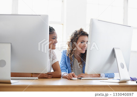 Women, computer or happy people in office talking, chatting or speaking of gossip or online news together. Internet, smile or friends in conversation or discussion about on blog or article at desk Women, computer or happy people in office talking, chatting or speaking of gossip or online news together. Internet, smile or friends in conversation or discussion about on blog or article at desk 133040897
