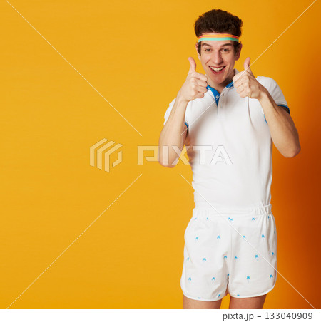 Man, fitness portrait and thumbs up isolated on studio background for winning, success and like, vote or thank you mockup. Face of retro athlete, sports or tennis person with okay and winner hands 133040909
