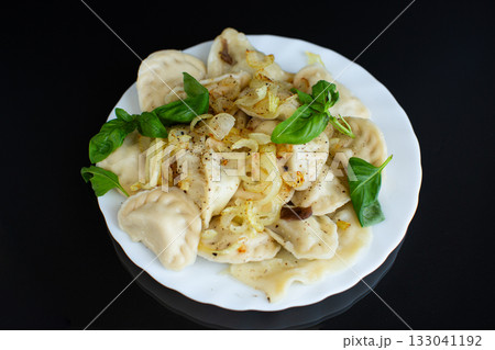 Dumplings with potatoes served for a festive dinner 133041192