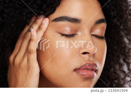 Cosmetics, black woman or skincare with beauty, dermatology or organic facial for wellness. African American female, lady or makeup for morning routine, grooming or treatment for healthy or soft skin Cosmetics, black woman or skincare with beauty, dermatology or organic facial for wellness. African American female, lady or makeup for morning routine, grooming or treatment for healthy or soft skin 133041504