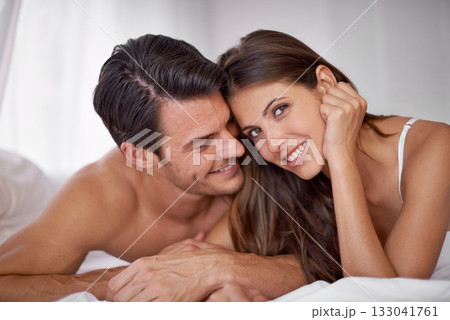Bedroom love, face portrait and happy couple relax for morning peace, calm and quality time together in Toronto Canada. Smile, vacation or romantic people bond in hotel bed for Valentines Day holiday 133041761