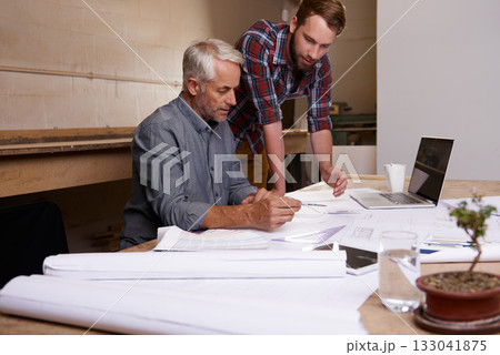 Architect, teamwork and men with blueprint in workshop for collaboration. Senior engineer, design and father and son planning, discussion and working on building project of apprentice with mentor. 133041875