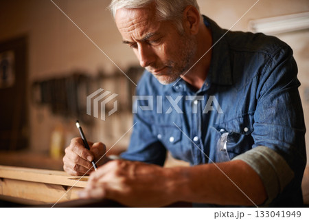 Carpentry, furniture manufacturing and man with pencil, focus and wood design workshop at small business. Creativity, thinking and professional, senior carpenter working on wooden designer project. Carpentry, furniture manufacturing and man with pencil, focus and wood design workshop at small business. Creativity, thinking and professional, senior carpenter working on wooden designer project. 133041949