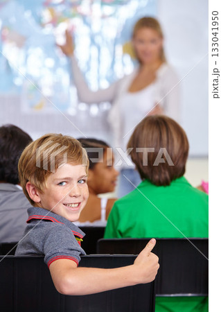 Child, portrait and thumbs up of student in classroom, elementary school or class. Smile, education and kid with hand gesture for like emoji, agreement or learning, success and approval sign. Child, portrait and thumbs up of student in classroom, elementary school or class. Smile, education and kid with hand gesture for like emoji, agreement or learning, success and approval sign. 133041950