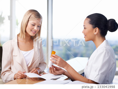 Spa receptionist, woman and product for beauty, wellness or cosmetics with offer, paperwork and benefit. Women, discussion and documents for health, cosmetic and smile together at salon help desk 133041998