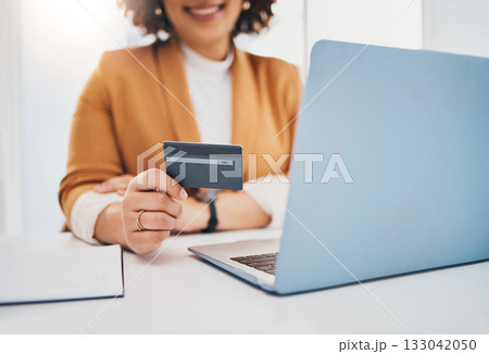 Credit card, business woman and laptop for ecommerce, online shopping or payment with fintech. Entrepreneur person hands for finance, banking and digital wallet or transaction on mockup website Credit card, business woman and laptop for ecommerce, online shopping or payment with fintech. Entrepreneur person hands for finance, banking and digital wallet or transaction on mockup website 133042050