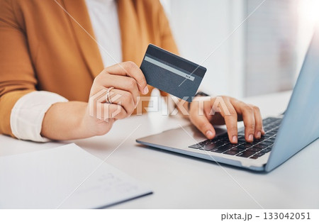 Hands, laptop and office with credit card for black woman, e-commerce and shopping on web with cybersecurity. Corporate executive, computer and ecommerce for sale, discount and fintech at workplace Hands, laptop and office with credit card for black woman, e-commerce and shopping on web with cybersecurity. Corporate executive, computer and ecommerce for sale, discount and fintech at workplace 133042051