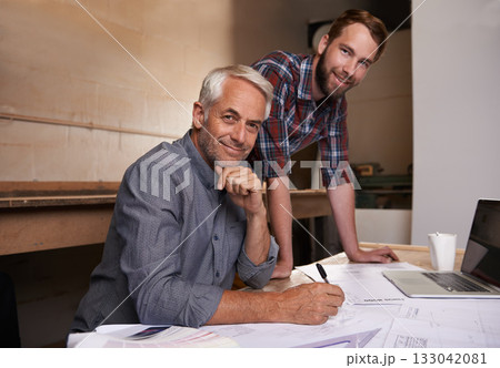 Architecture, teamwork and portrait of men in workshop for collaboration on carpentry design. Senior architect, smile and father and son working on blueprint with trainee, apprentice and mentor. Architecture, teamwork and portrait of men in workshop for collaboration on carpentry design. Senior architect, smile and father and son working on blueprint with trainee, apprentice and mentor. 133042081